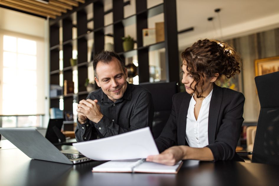 A condo board of directors reviewing a proposal for a new condominium management firm in Ontario, Canada