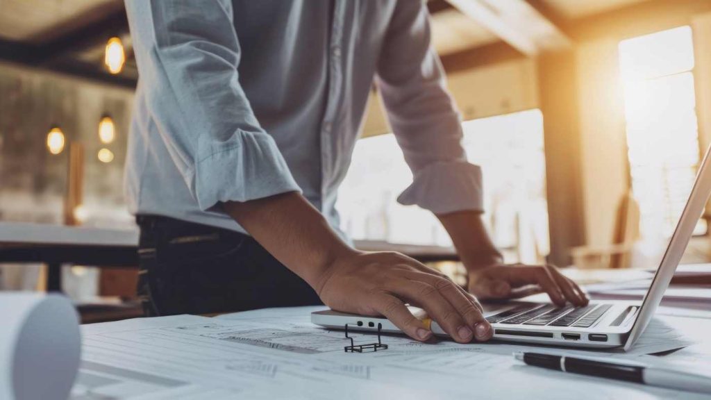 Close up of condo reserve fund study being reviewed at a desk in Ontario.